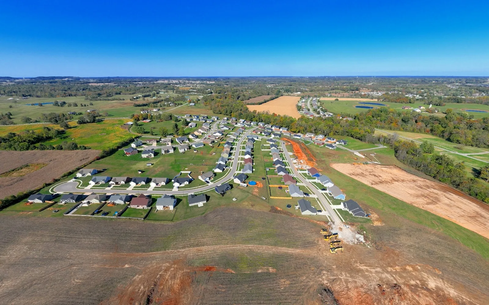 October 2023 — Baseline documentation captures the existing subdivision and the first active earthwork areas.